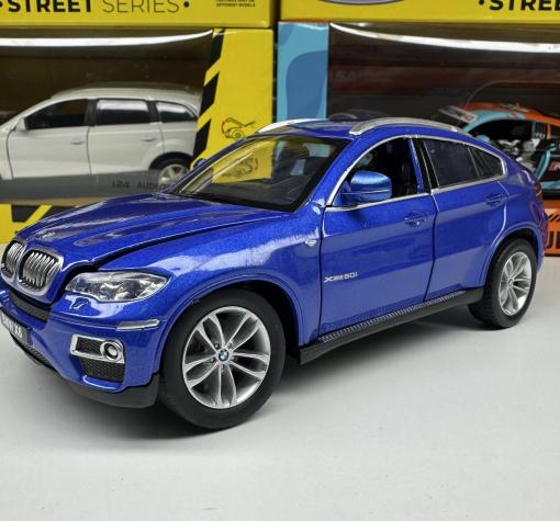 Метална кола с отварящи се врати и капаци BMW X6 1:24