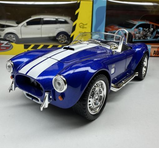 Метална кола с отварящи се врати капаци светлини и звуци Ford Shelby Cobra 427 1:24
