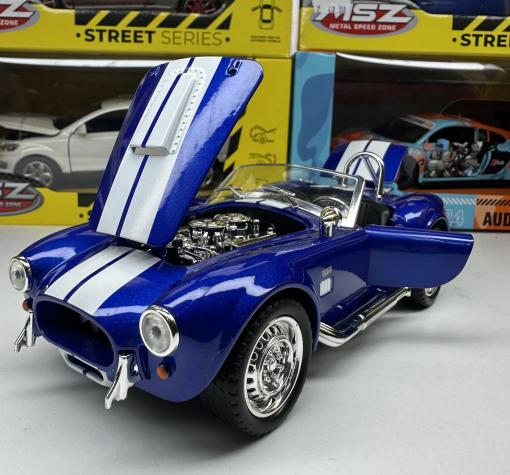Метална кола с отварящи се врати капаци светлини и звуци Ford Shelby Cobra 427 1:24 — снимка 2
