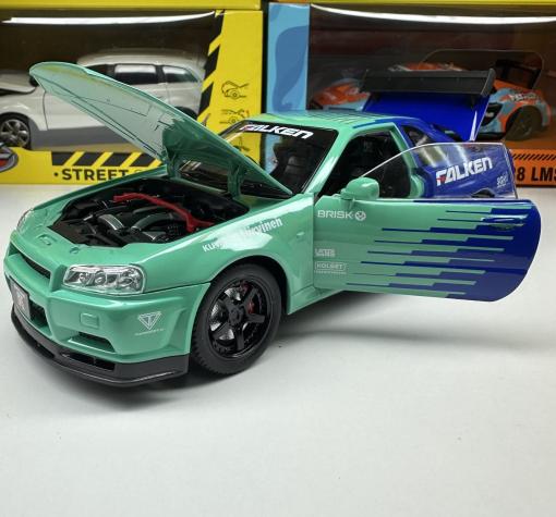 Метална кола с отварящи се врати, светлини и звуци Nissan Skyline GT-R 1:24 — снимка 2
