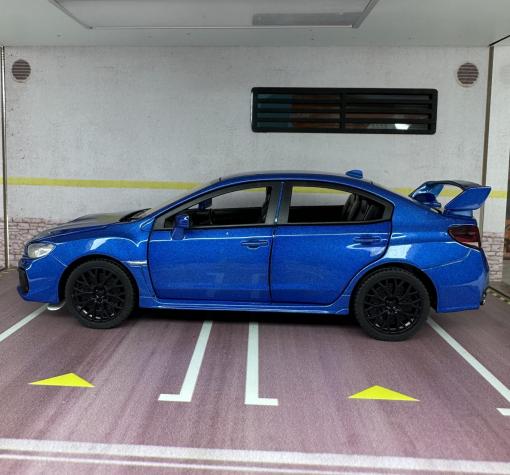 Метална кола с отварящи се врати капаци светлини и звуци Subaru Impreza 1:32 — снимка 4