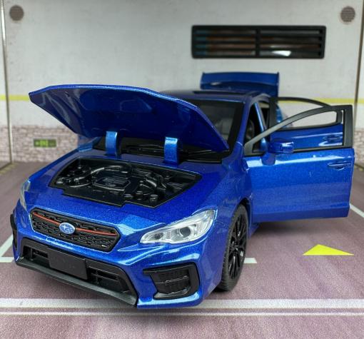 Метална кола с отварящи се врати капаци светлини и звуци Subaru Impreza 1:32 — снимка 2