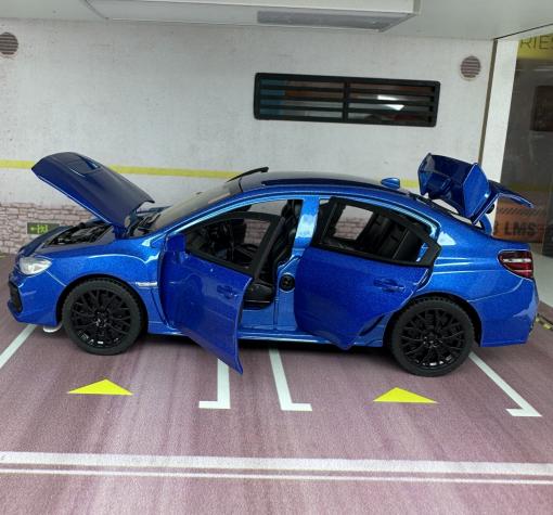 Метална кола с отварящи се врати капаци светлини и звуци Subaru Impreza 1:32 — снимка 3