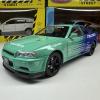 Метална кола с отварящи се врати, светлини и звуци Nissan Skyline GT-R 1:24